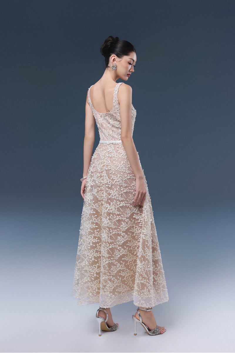 Elegant JOSÉPHINE RIKA lace midi dress displayed on a hanger, showcasing intricate lace details and a sophisticated design.