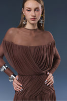 Brown Astra maxi dress by JOSÉPHINE featuring a flowing silhouette and elegant design, perfect for casual or formal occasions.