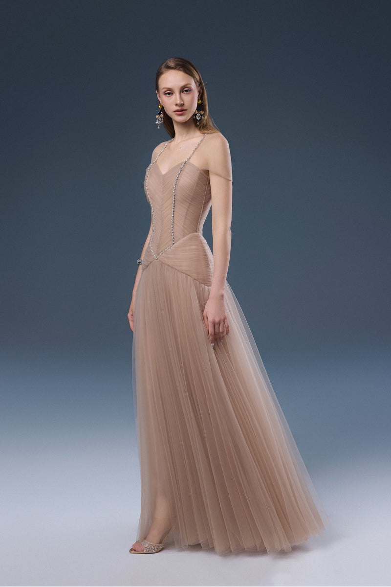 Elegant DELIAH tulle maxi dress by JOSÉPHINE featuring flowing fabric and intricate detailing, perfect for formal occasions.