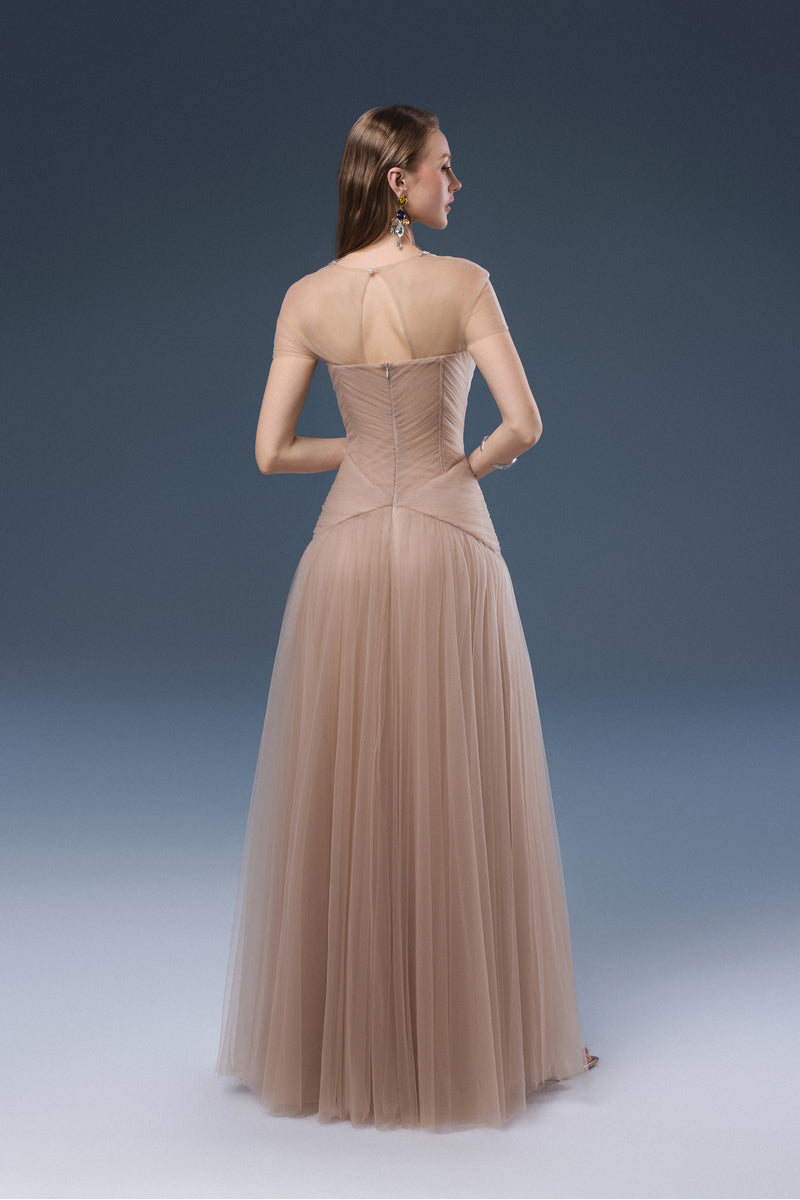 Elegant DELIAH tulle maxi dress by JOSÉPHINE featuring flowing fabric and intricate detailing.