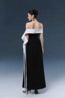 Black Magnolia gown by JOSÉPHINE with elegant design, flowing fabric, and sophisticated silhouette.