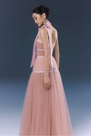 Pink Joséphine Bliss gown with flowing fabric and elegant design, perfect for formal occasions or special events.
