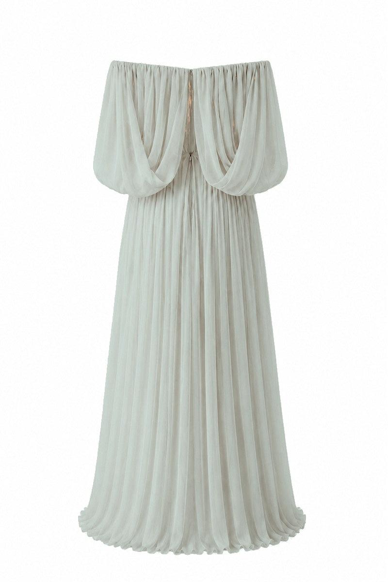 Green Juliette dress by Nihan Peker, elegant gown with flowing fabric and detailed design, perfect for formal occasions.