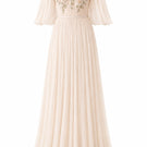 Elegant vanilla Juliette dress gown by Nihan Peker featuring flowing fabric and intricate detailing, displayed on a mannequin.