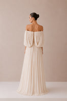Nihan Peker Juliette gown in vanilla color, elegant dress with flowing fabric and detailed design, perfect for formal occasions