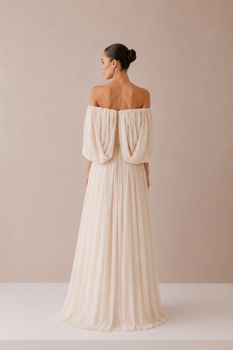 Nihan Peker Juliette gown in vanilla color, elegant dress with flowing fabric and detailed design, perfect for formal occasions