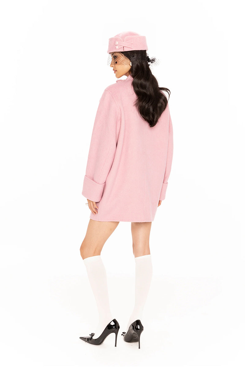 Nana Jacqueline Juliette cocoon coat in pink, shown on model with oversized fit and cozy design, perfect for stylish winter wear.