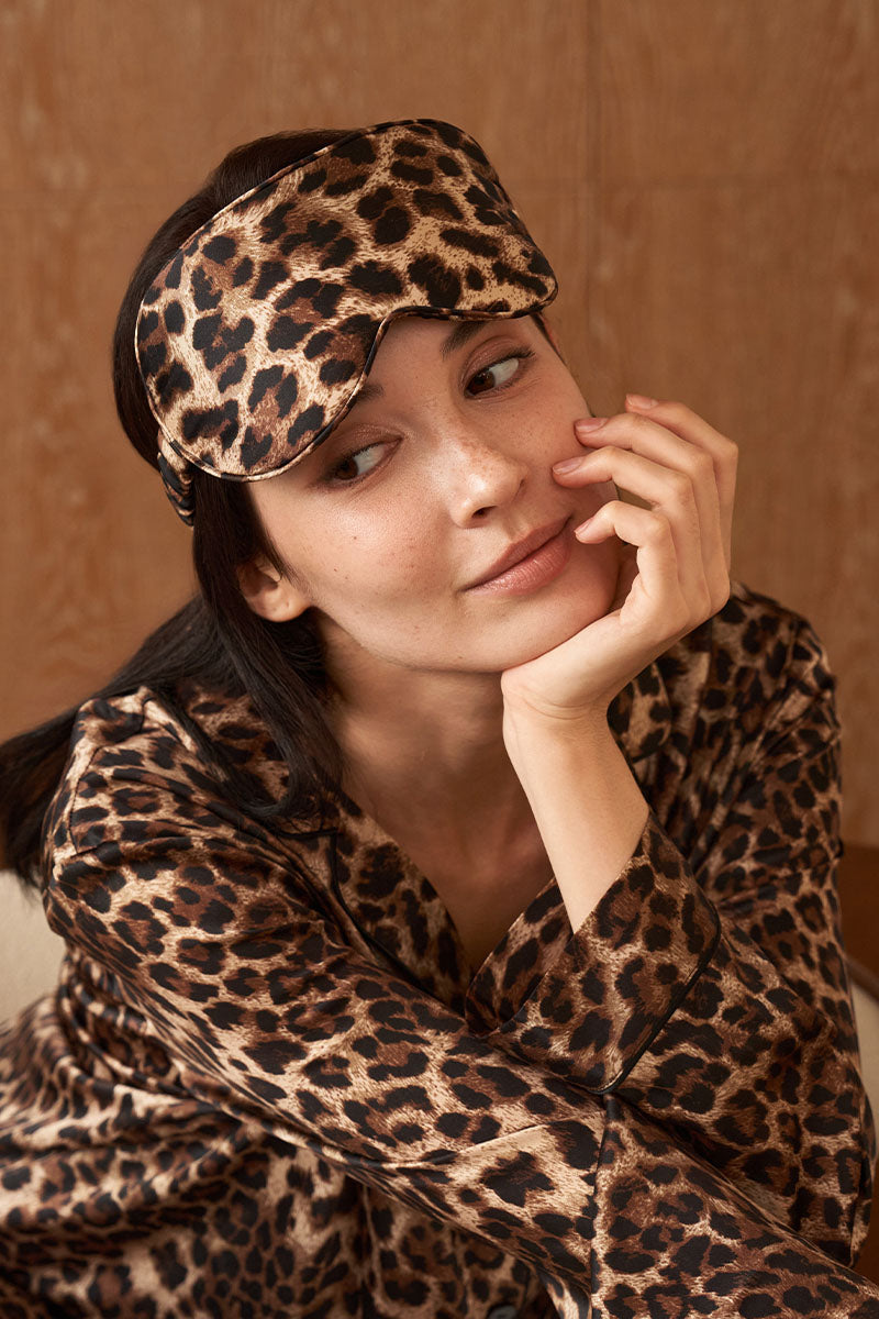 Manito jungle leopard silk eye mask featuring a bold leopard print design, soft and comfortable for sleep or relaxation.