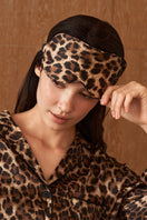 Manito jungle leopard silk eye mask featuring a bold leopard print design for comfortable sleep or relaxation.