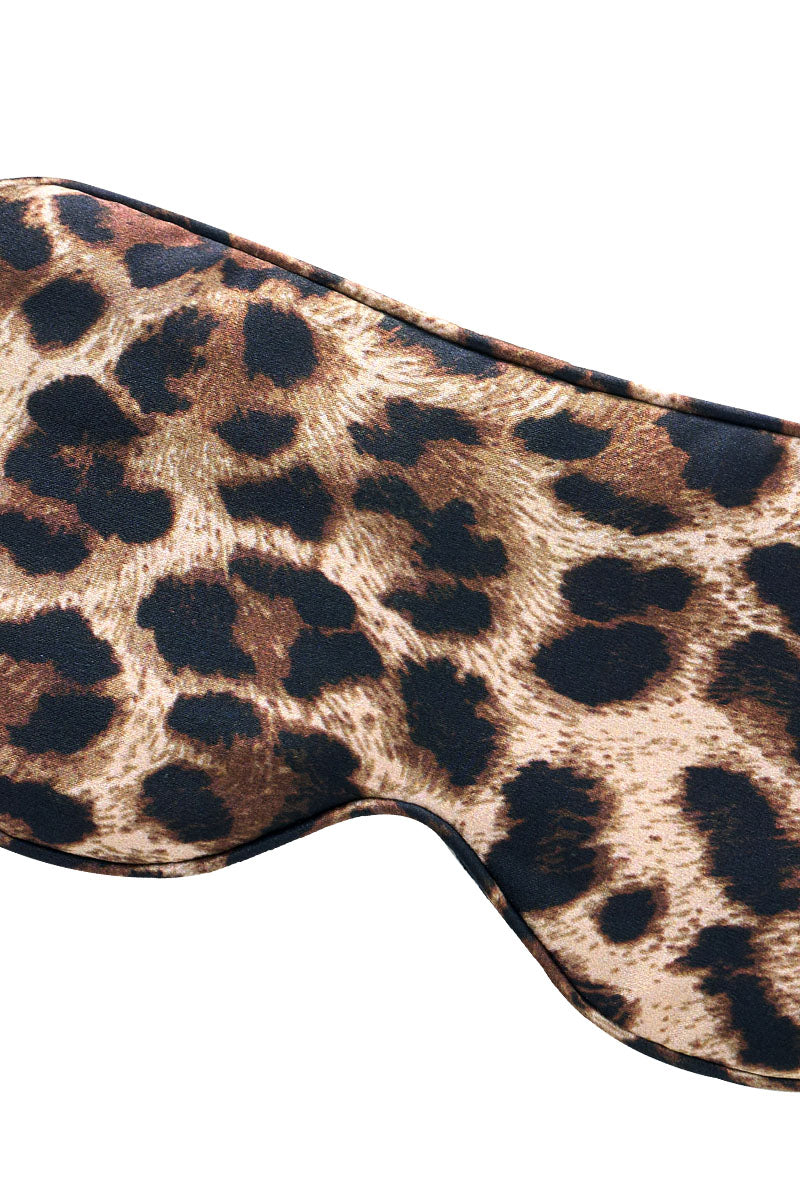 Manito jungle leopard silk eye mask with leopard print, soft and luxurious for restful sleep or relaxation.