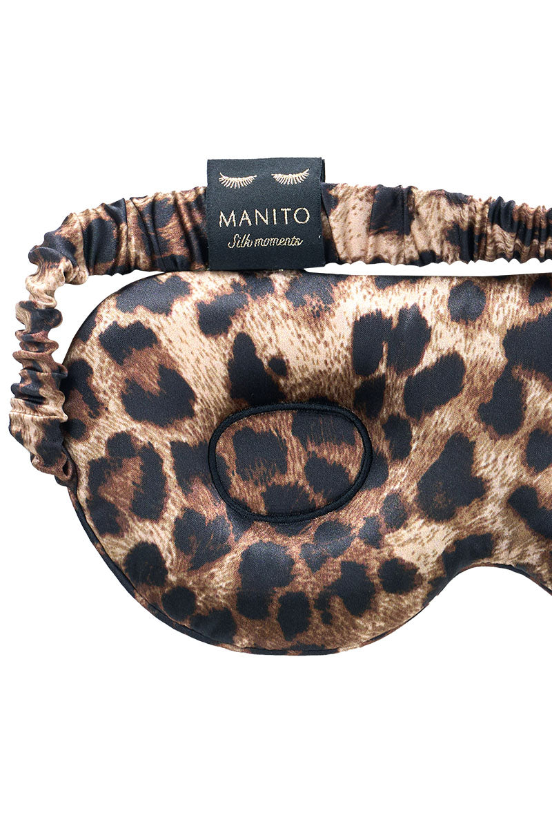 Manito jungle leopard silk eye mask featuring a leopard print design, soft and luxurious for comfortable sleep.