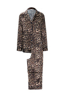 Women's silk pajama set with jungle leopard print by MANITO, featuring a relaxed fit and luxurious fabric for comfortable sleepwear.