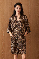 Women's silk robe in leopard print by MANITO, featuring a stylish jungle leopard design and luxurious fabric.