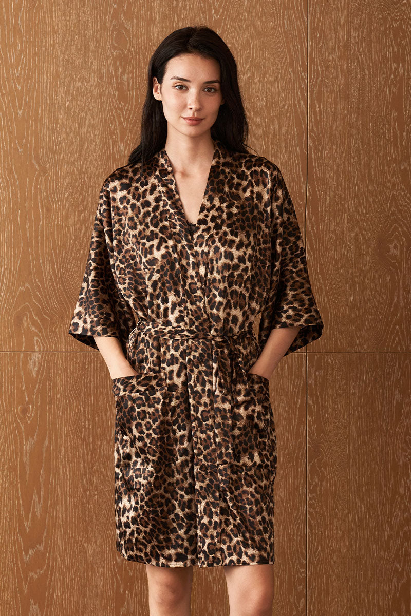 Women's silk robe in leopard print by MANITO, featuring a stylish jungle leopard design and luxurious fabric.