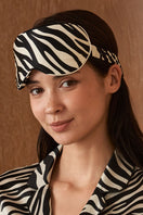 Manito jungle zebra print silk eye mask featuring a bold zebra pattern, perfect for sleep or relaxation.