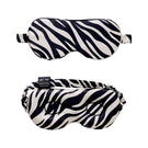 Manito jungle zebra print silk eye mask featuring black and white zebra pattern for comfortable sleep and elegant style.