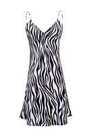 Women's silk chemise with jungle zebra print by MANITO, featuring a smooth, flowing fabric and stylish zebra pattern.