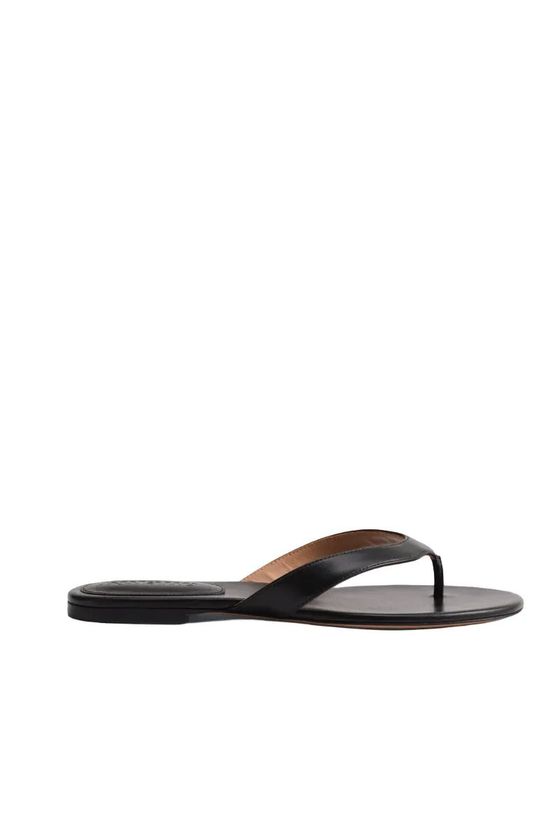 Black Kolane Rio sandal with strappy design and flat sole, shown on a neutral background.