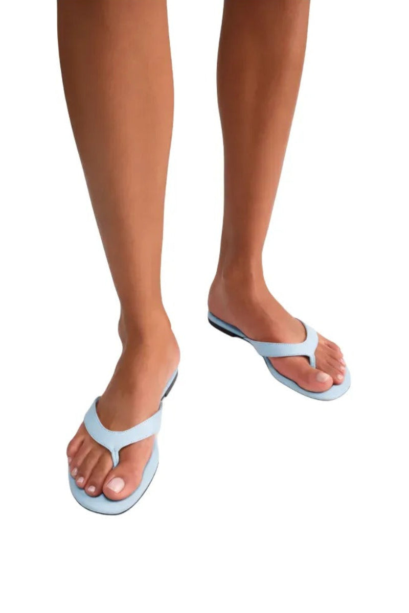 Kolane Rio Sandal in powder blue with open toe design and flat sole, showcasing comfortable casual footwear for summer wear.
