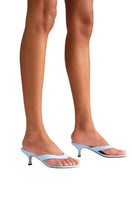 Powder blue Annie sandal by Kolane featuring strappy design and flat sole, perfect for casual summer wear.