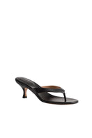 Black Kolane Annie sandal with open toe and ankle strap, featuring stylish design and comfortable fit.