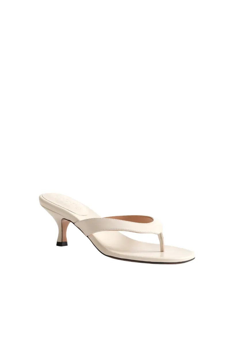 Kolane Annie Sandal 45 in Ivory featuring a stylish open-toe design with ankle straps and elegant detailing.