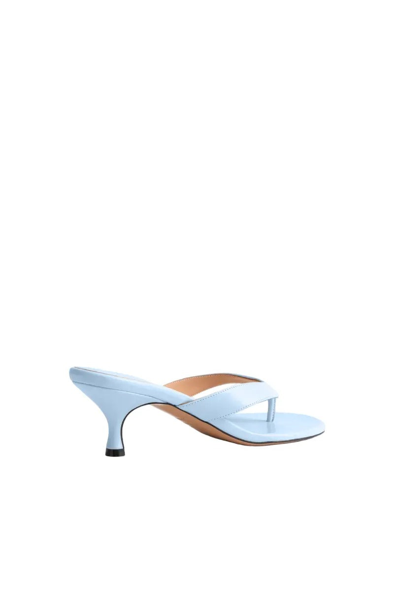 Kolane Annie Sandal 45 in powder blue with open toe design, featuring sleek straps and a comfortable flat sole.