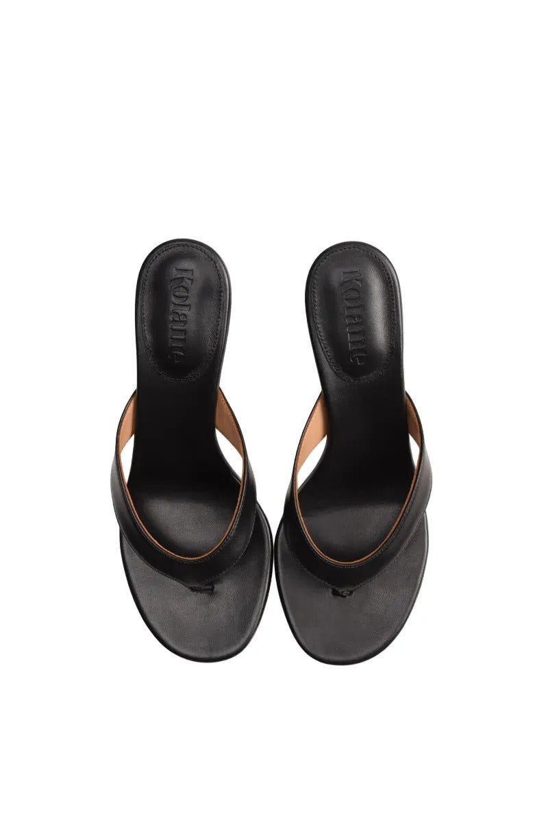 Black Annie Sandal 45 by Kolane, stylish open-toe sandals with ankle straps, displayed on a white background.