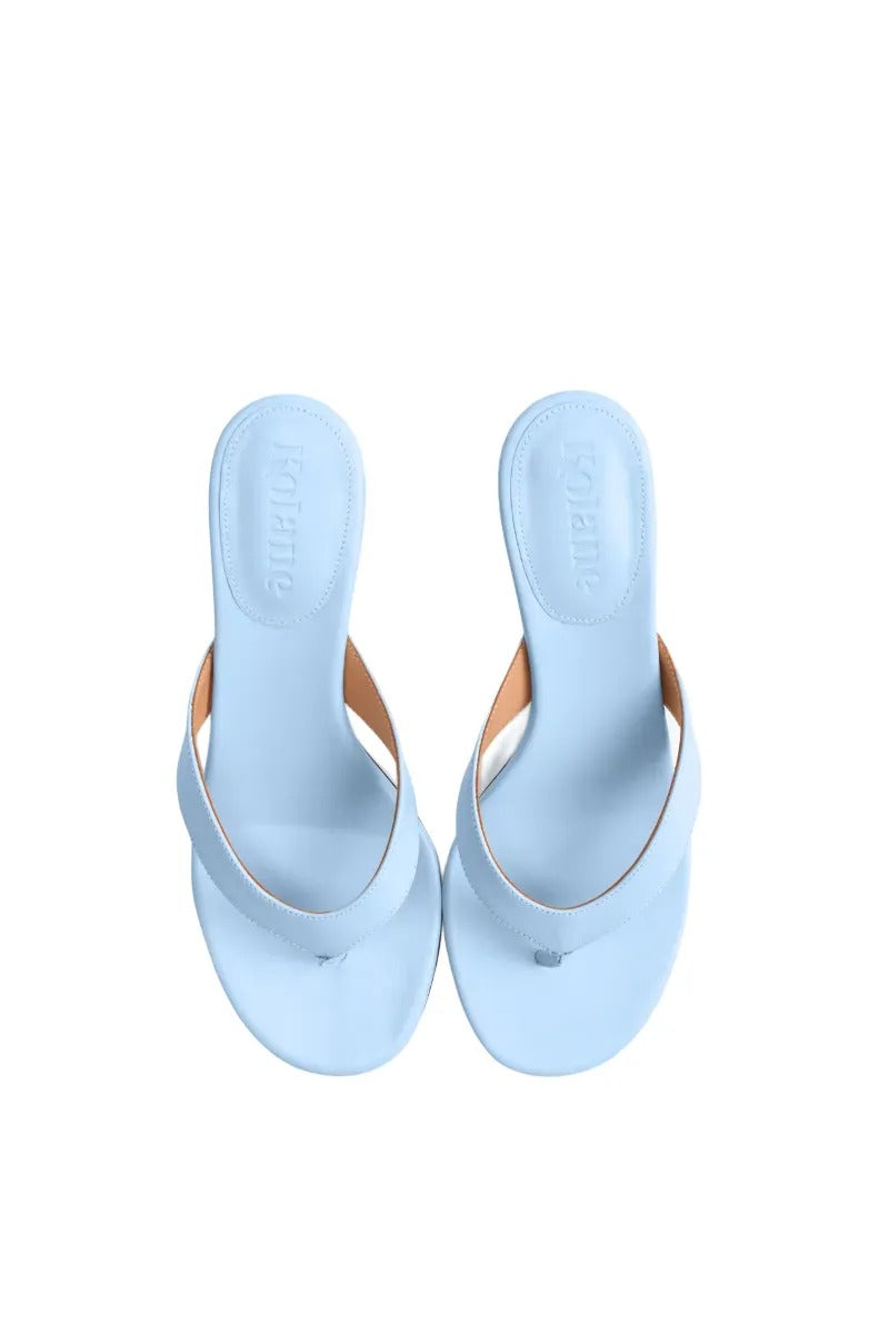 Kolane Annie Sandal 45 in powder blue, stylish open-toe sandals with a sleek strap design and block heel.