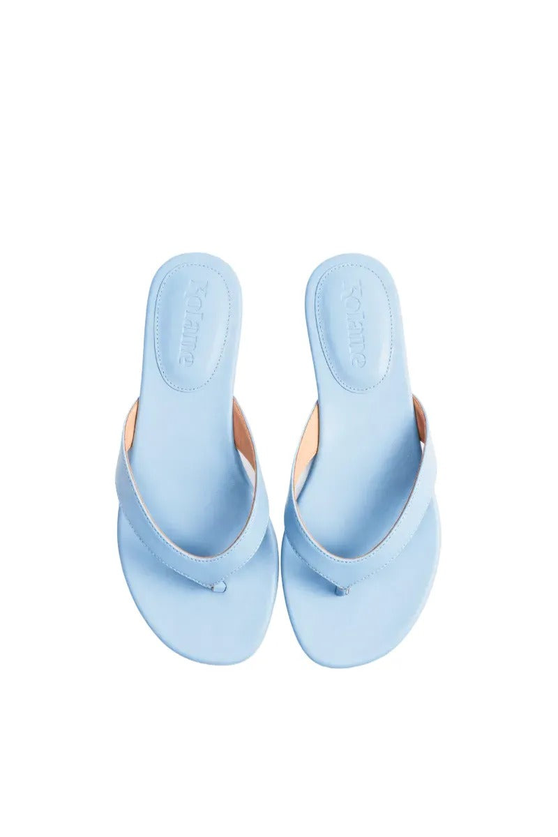 Kolane Rio sandals in powder blue, stylish open-toe sandals with ankle straps and comfortable flat soles.