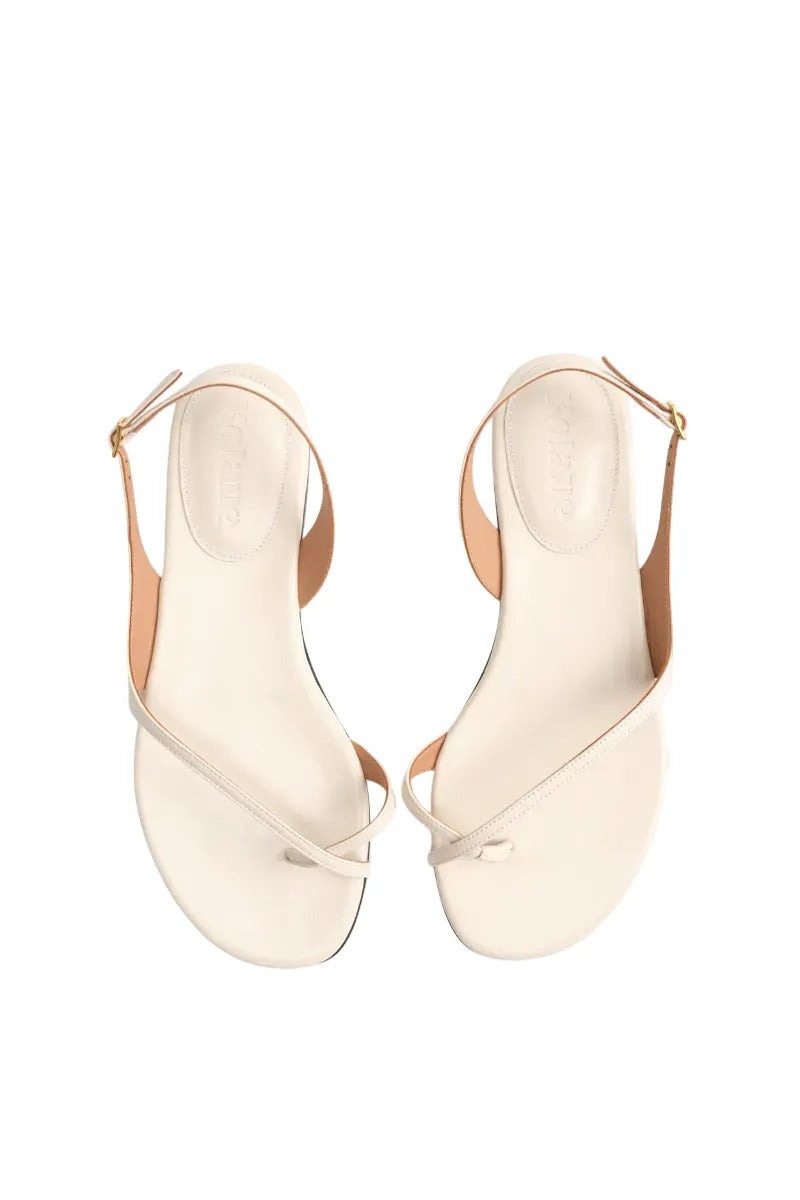 Kolane Esme Ivory Sandals with open toe design and ankle straps, stylish footwear for summer and casual wear.
