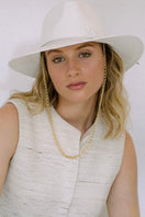 Modern Monarchie KAIA hat featuring a stylish bonem color, lightweight and versatile for casual or elegant outfits.