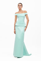 Light mint KEI gown by MOON / HAKAAN YILDIRIM, shown in a soft, flowing fabric with elegant design details.