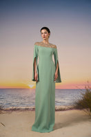 Mint green Calypso crepe gown by 21Six, elegant long dress with flowing fabric and stylish design.