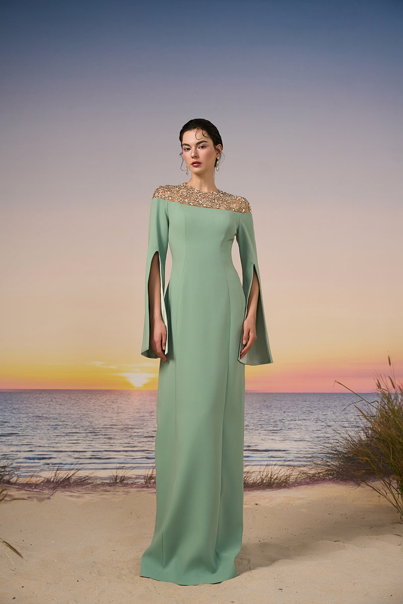 Mint green Calypso crepe gown by 21Six, elegant long dress with flowing fabric and stylish design.