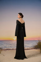 Black Azure crepe gown by 21Six, elegant long dress with flowing fabric and sophisticated design.