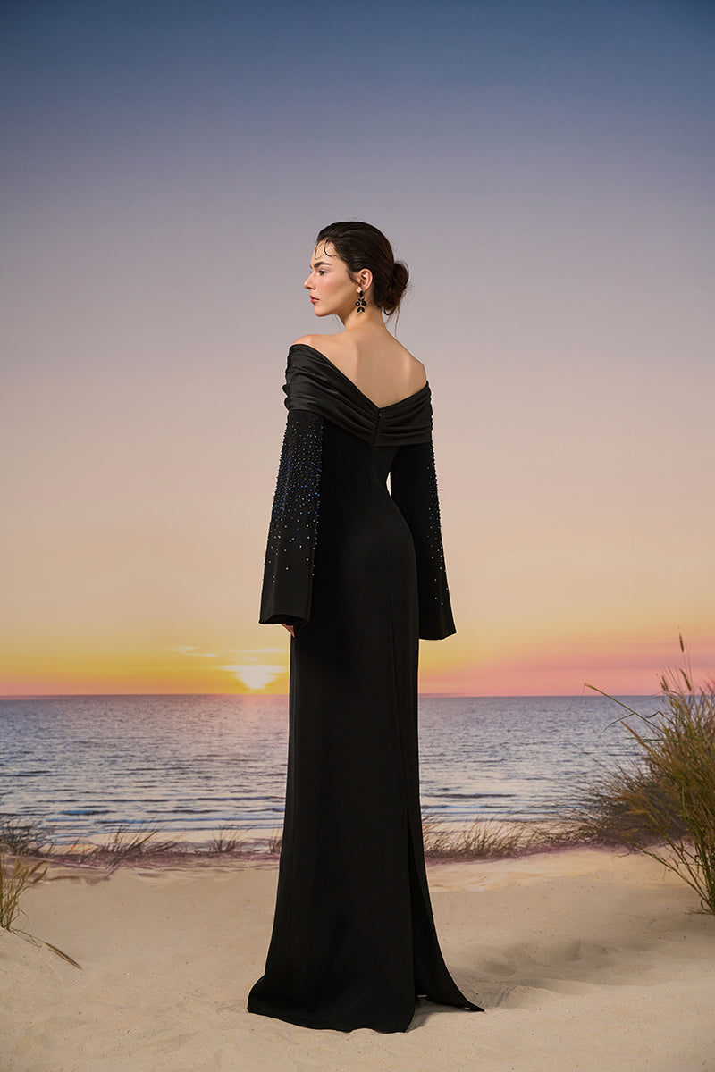 Black Azure crepe gown by 21Six, elegant long dress with flowing fabric and sophisticated design.