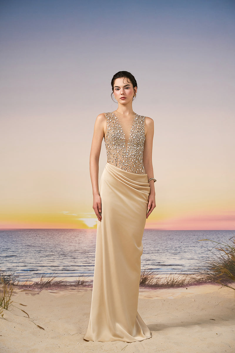Beige silk satin and tulle gown by 21Six, elegant design with flowing fabric showcasing the luxurious dress.