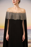 Black ZAHARA crepe gown by 21Six, featuring elegant draping and a sophisticated silhouette, perfect for formal occasions.