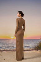 Brown NOMIE gown by 21Six featuring a Solistra gold-plated brooch, elegant and stylish evening wear.