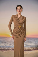 Brown NOMIE gown by 21Six featuring a Solistra gold-plated brooch, elegant and stylish for formal occasions.