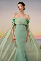 Elegant mint VANA crepe and chiffon gown by 21Six, featuring flowing fabric and a stylish silhouette.