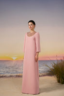 Light rose Eira crepe gown by 21Six featuring a flowing silhouette and elegant design for formal occasions.
