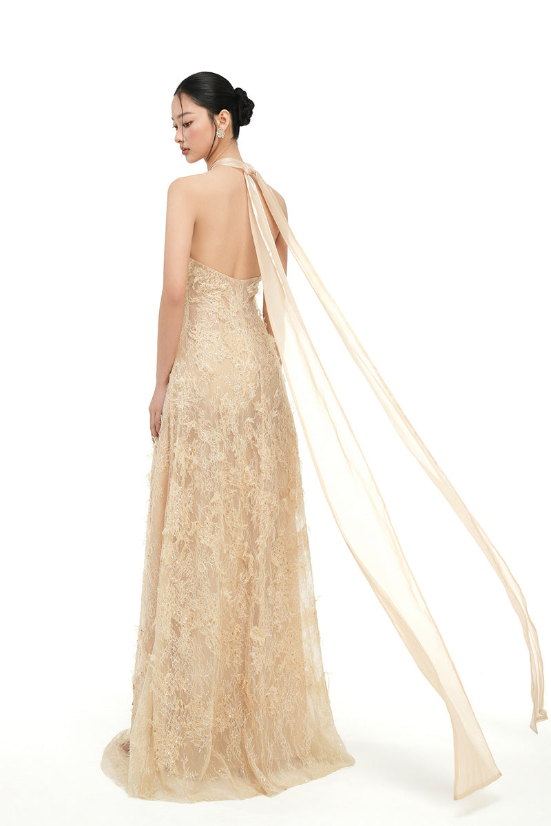 Beige Alisa lace gown by 21Six featuring intricate lace details and a flowing silhouette, perfect for elegant occasions.