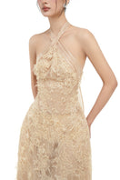 Beige Alisa lace gown by 21Six, featuring elegant lace details and a flowing silhouette.