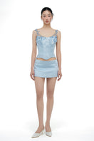 Light blue silk taffeta co-ord set featuring a Delilah top and Marielle skirt by 21Six, displayed on a model.