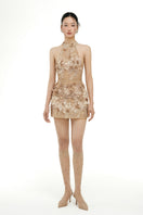 Beige Emilia lace mini dress by 21Six, featuring intricate lace details and a stylish fit, displayed on a hanger.
