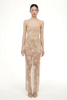 Beige Annabelle tulle maxi dress by 21Six, featuring flowing fabric and elegant design, suitable for special occasions.