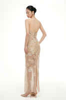 Beige Annabelle tulle maxi dress by 21Six with flowing fabric and elegant design, displayed on a hanger.