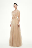 Beige Grace Tulle Dress by 21Six, elegant gown with flowing tulle fabric, perfect for formal occasions.